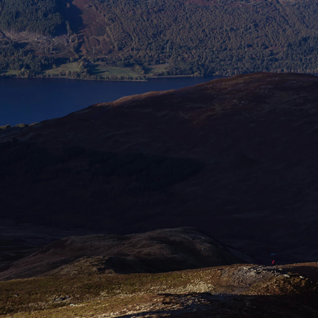 A lone walker descending Ben Vorlich