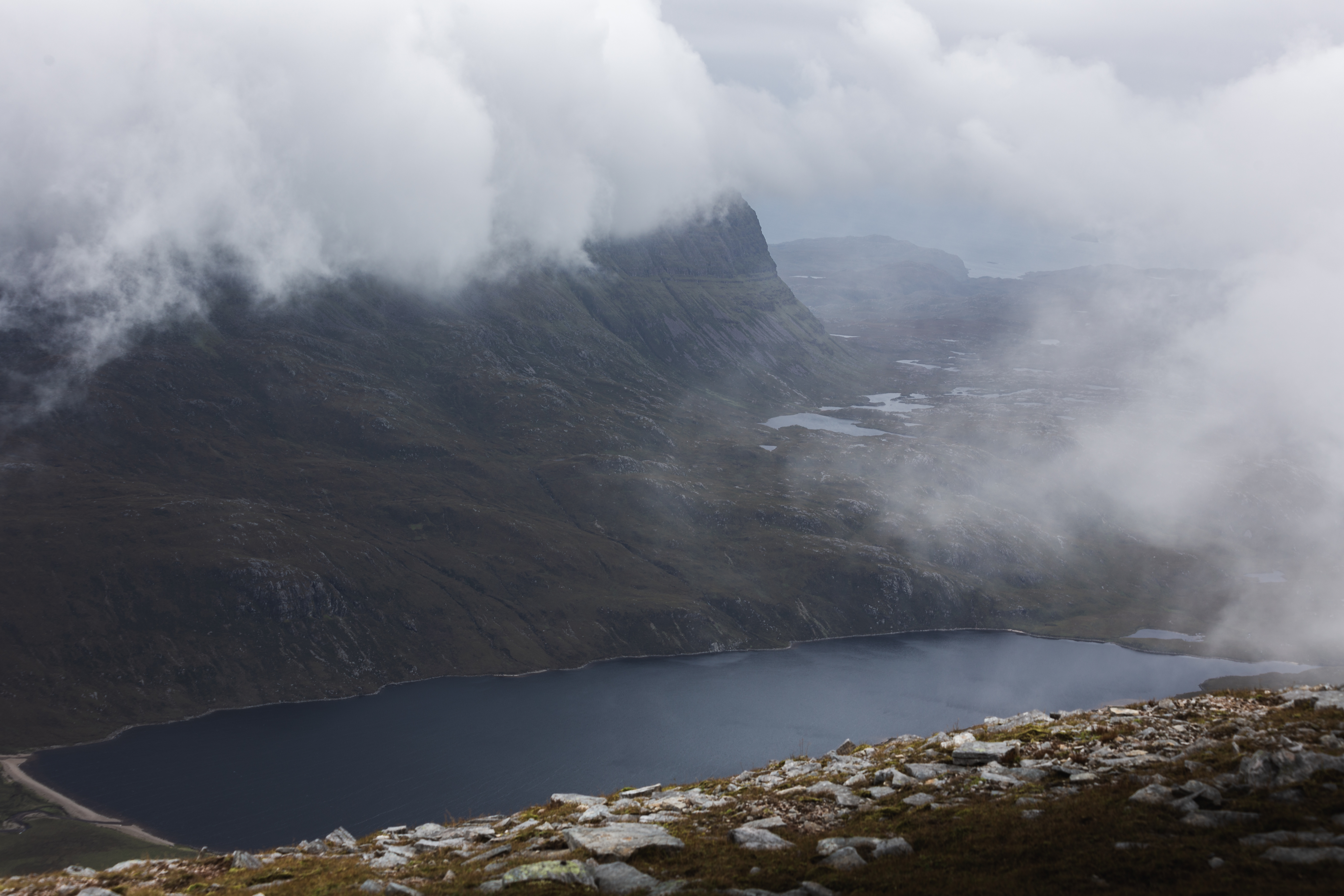 A view of Suilven, topped with cloud, from Canisp
