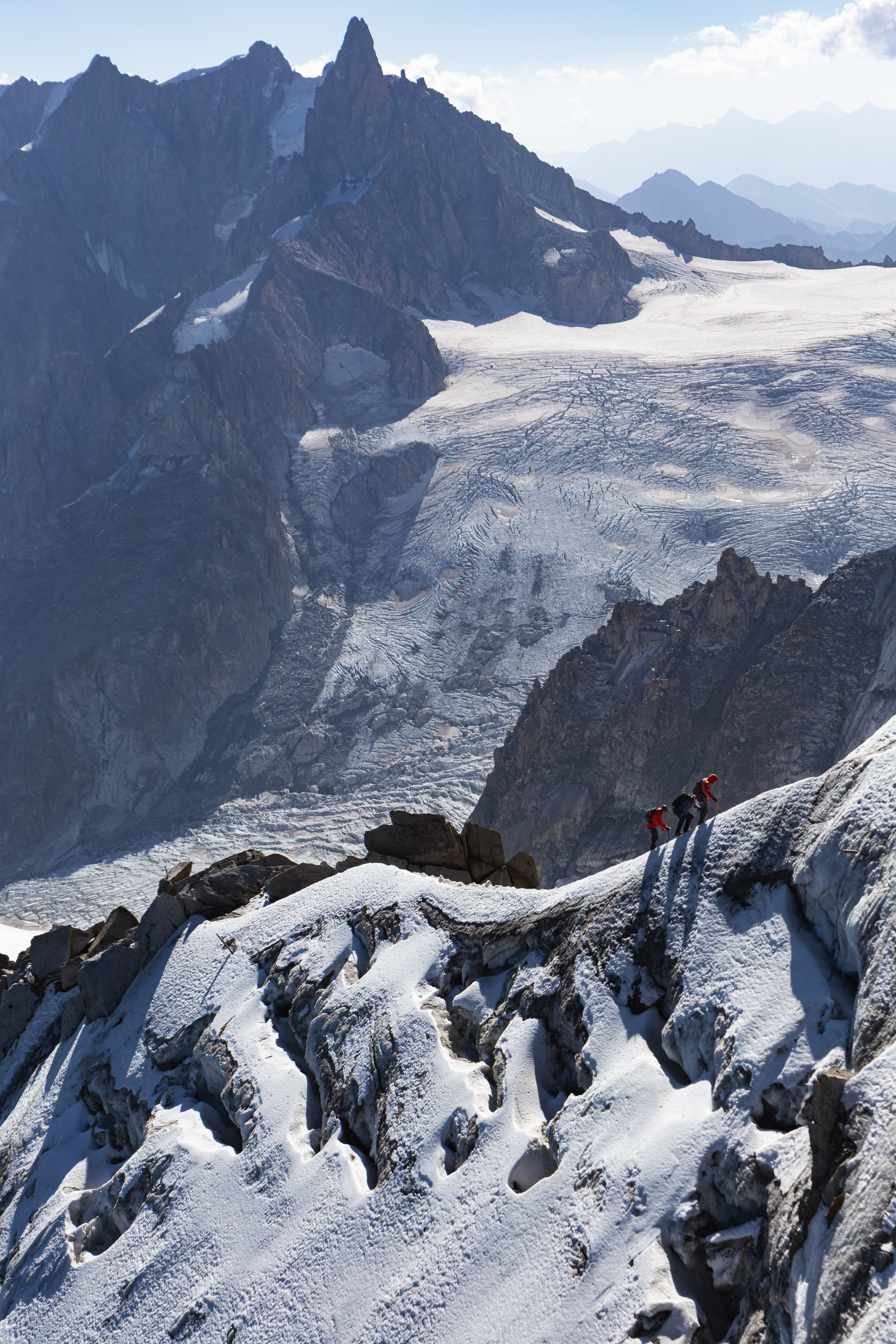 Three climbers at Aiguille du Midi