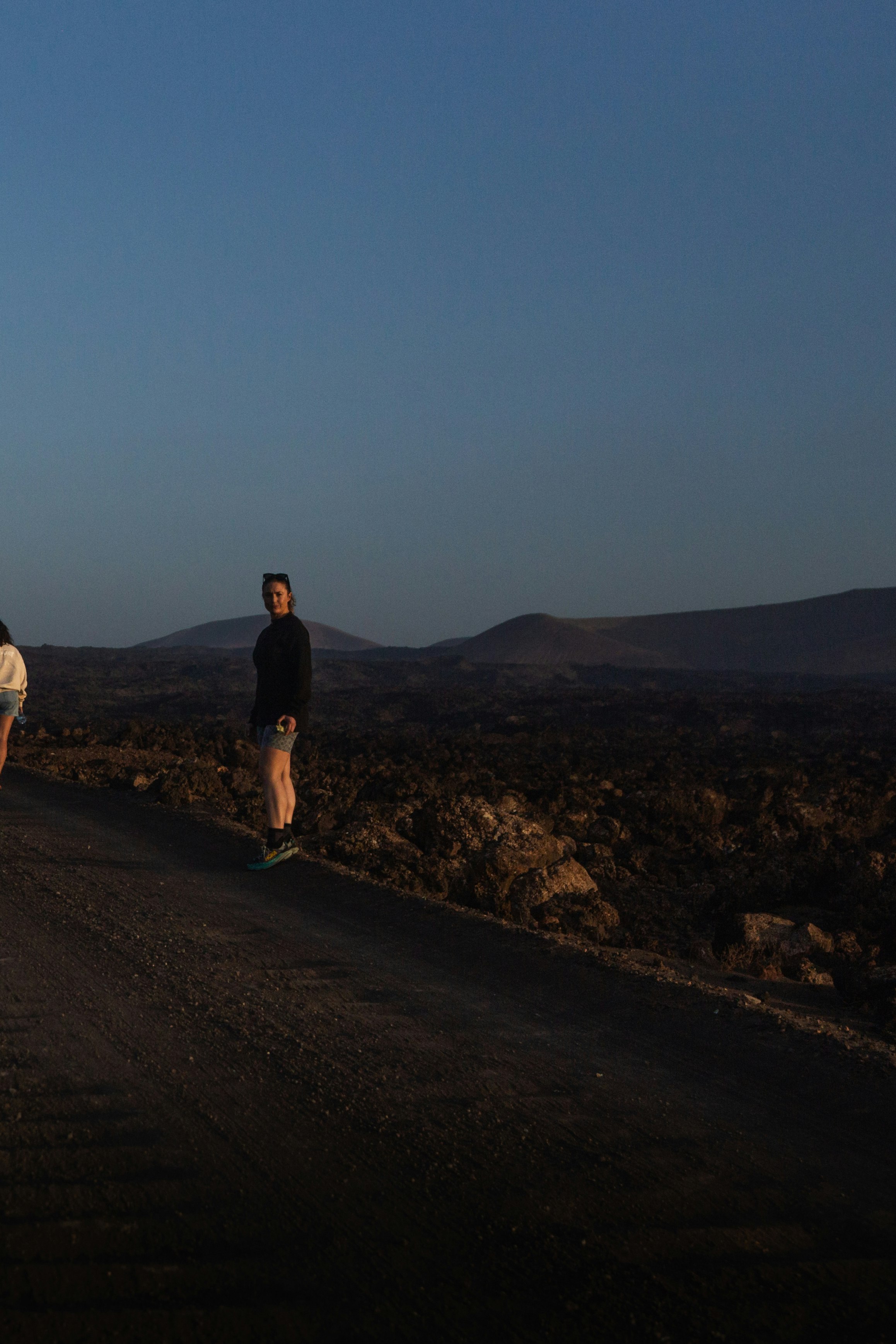 Kerry and Sarah on the road at dusk